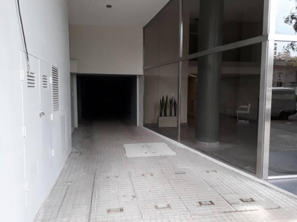 VENTA COCHERA en PB y 1er piso de edificio - Av. Pellegrini 563