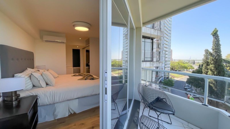 VENTA - Piso exclusivo. Dos dormitorios.  Vista franca al rio.  Amplio balcon corrido.  Amenities. Cochera.  BARRIO MARTIN. ENTREGA INMEDIATA