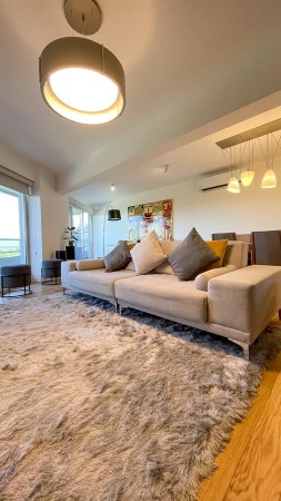 VENTA - Piso exclusivo. Dos dormitorios.  Vista franca al rio.  Amplio balcon corrido.  Amenities. Cochera.  BARRIO MARTIN. ENTREGA INMEDIATA