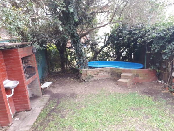 VENTA CONDOMINIO en FUNES, 4 casas independientes de un dormitorio con patio.